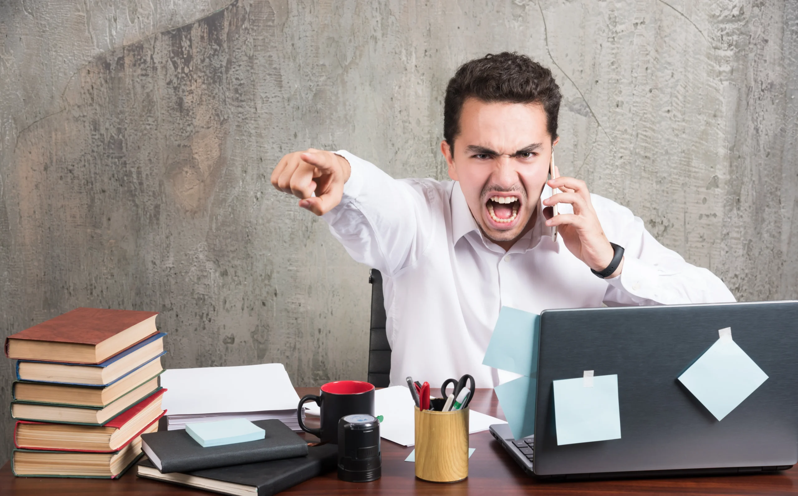 angry man talking with telephone