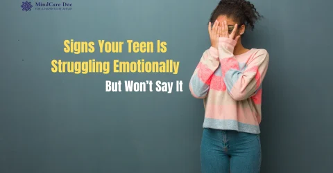 Teen girl covering her face, symbolizing emotional distress and hidden mental health struggles in adolescents.