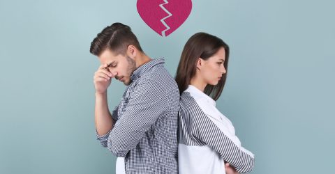 Upset young couple on color background. Relationship problems showing couples problems or issues in a frame